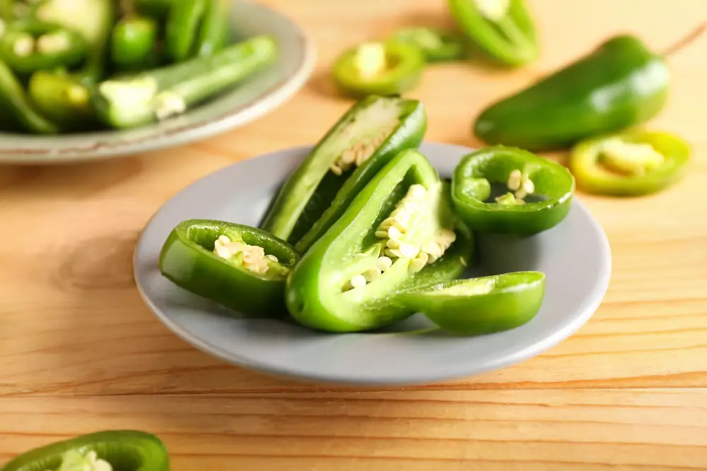 Plate with Cut Green Jalapeno Peppers - Jalapeno - Best Tips on How to Get Jalapeno Out of Your Eye!